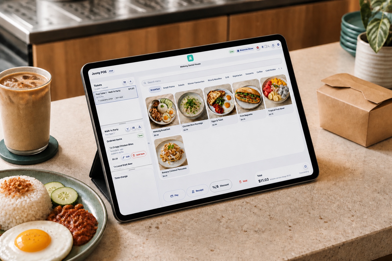 Joony POS running on a tablet at a restaurant counter
